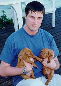 Neil Cotty with 2 pups from our Brandy litter